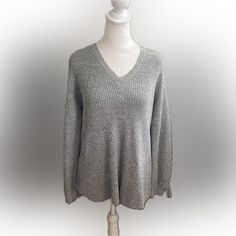 American Eagle Outfitters Nwt Wool Blend V-Neck Sweater Size Small Oversized Nwt Made In China 55% Cotton, 25% Acrylic, 15% Nylon, 5% Wool Rn# 54485 Pit To Pit: 21” Gray V-neck Sweater For Loungewear, Oversized Cozy V-neck Top, Gray V-neck Sweater For Spring, Casual V-neck Relaxed Fit Sweater, Relaxed Fit Knit V-neck Sweater, Gray V-neck Sweater For Spring Layering, Oversized Long Sleeve Gray V-neck Sweater, Cozy Gray V-neck Top, Casual Gray Knit V-neck Sweater