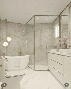 a bathroom with a tub, sink and shower in it's own area is shown