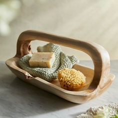 a wooden tray with some food on it