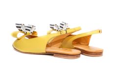 "Handmade yellow flat leather slingback sandals, embellished with double bow and easy to put they are must have pair of shoes for every summer yet to come. They will simply add a kick to any summer outfit you choose. Wedding or not here they come. The cushioned insole will make them only inseparable part of everyday choice. They're designed to look stylish enough to take you \"from day to night. Full leather outer, interior and sole. DETAILS: Full leather upper, lining and sole Pink napa leather Closed Toe Sandals With Bow For Summer, Yellow Closed Toe Slingback Sandals For Spring, Leather Sandals With Bow For Spring, Yellow Slingback Sandals With Removable Insole, Spring Bow Strap Sandals With Round Toe, Flat Heel Leather Sandals With Bow, Leather Sandals With Bow And Flat Heel, Leather Flat Heel Sandals With Bow, Chic Yellow Slingback Pumps For Summer