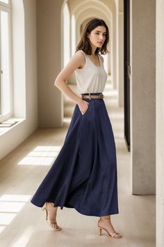 "You'll feel ultra chic and modern wearing the A Line skirt throughout the year, the long skirt will be a prefect on for your summer spring.Can be worn with a white top for a more trendy look. DETAIL *50% Linen, 50% cotton *No Liner *Two side pockets *Back elastic waistband *Right Hidden Zipper closure *Ankle length *Belt model wears is not for sale * Perfect for Summer and spring *Machine Washable in Warm/Cold Water/Do not bleach /Mid-iron /Hang Dry More Color https://etsy.me/3t1IjnY CUSTOM ORDER Can't find your size in our size Chart Chang the Length Your Height is not Between 5'1\" - 5\"9\" Your weight is not Between 47 kg - 75 kg SIZE GUIDE Size vary between Brand and Country Please get your body measurement with our Size Guide And Find your size in our Size Chart SIZE CHART https://ww Flowy Solid Color Maxi Skirt, Chic Maxi Length Solid Color Skirt, Chic Solid Color Maxi Skirt, Relaxed Maxi Skirt For Work, Spring Solid Color Long Maxi Skirt, Solid Color Maxi Skirt For Summer, Summer Maxi Skirt In Solid Color, Wide Leg Pleated Maxi Dress For Summer, Chic Wide Leg Pleated Maxi Dress