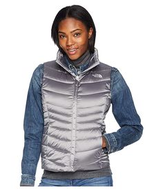 The North Face Aconcagua Vest II (Shiny Mid Grey) Women's Vest Please note the logo and hardware color may vary in styles marked as Prior Season. The North Face Aconcagua Vest II is a versatile vest that works just as well on its own as it does layered! Standard fit is eased but not sloppy and perfect for any activity. DWR Coating â? Durable Water-Resistant (DWR) coating sheds light moisture and helps the fabric dry quickly. Goose Down Fill in body #TheNorthFace #Apparel #Top #Vest #Multi North Face Vest, Reversible Vest, Faux Leather Moto Jacket, Color Coral, Down Parka, Animal Print Dresses, Grey Women, North Face Women, North Face Jacket