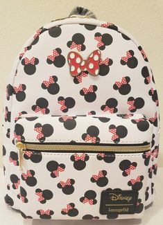 Minnie Mouse Loungefly Minnie Mouse Disney Mini Backpack. A perfect gift for any Disney fan.  All my bags are brand new with the original tags. Smoke free home. Size: approximately 9x5x11. The photos for this listing are stock photos. This means that the print design on the bag shown in the pictures, is not necessarily the exact bag that you will receive. It will have all the same characters. They just might be featured in different locations on the bag. I leave feedback for all of my transactio Red Minnie Mouse Backpack For Disney Trips, Red Disney Minnie Mouse Backpack, Trendy Minnie Mouse Travel Backpack, Disney Red Minnie Mouse Backpack, Disney Minnie Mouse Red Backpack, Trendy Minnie Mouse Backpack For Travel, Red Minnie Mouse Standard Backpack, Cute Red Backpack For Disney Trips, Casual Minnie Mouse Backpack For Travel