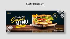 a banner for a restaurant with a burger and fries on the table in front of snowflakes