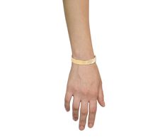 Stunning in its minimal, modern design, this Uniform Object cuff exudes an edgy elegance. The wide, polished 18K yellow gold cuff has a hinged opening so that the bracelet can easily be slipped over your wrist. A group of shimmering white diamonds are set asymmetrically for a pop of sparkle. Statement-making whether worn alone or stacked with your other favorites. interior dimensions : 1 3/4" x 2 1/2"diamonds : vary : 2mm diameter to 3mm diameter each18K white gold bracelet width : 13.5mmno clas Classic Bangles, Yellow Gold Bangle, Traditional Diamond, Chain Loop, Designer Fashion Jewelry, Bar Bracelets, Gold Bracelet Chain, Yellow Gold Bracelet, Yellow Gold Chain