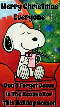 a snoopy christmas card with a dog holding a cup in front of a tree