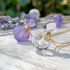 ✨These charming tiny potion bottles will become your go to accessory! These petite crystal perfume pendants unscrew and can hold .5 mL of your favorite go to scent whether an essential oil blend or your favorite perfume. Pipette included to add your favorite scent.    ✨These beautiful gemstone bottles hang from a gold plated chain with extender and gemstone dangle.  Last photo gives you an idea of where the necklace falls.  Petite and sweet!  They look so cute when layered with a longer necklace. Approx. 16" long with a 2" extender Pick your Fave! Amethyst bottle:   approx 1" long, 3/4" widest part of bottle, Ametrine dangle at clasp Clear Quartz:   approx 1" long, 3/4" widest part of bottle, Clear Quartz dangle at clasp Comes nicely packaged. If you have any questions, please let me know. Love Potion Bottle, Bottle Perfume, Vial Necklace, Potion Bottles, Crystal Perfume Bottles, Pipettes, Love Potion, Bottle Charms, Potion Bottle