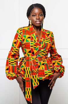 Shawl Collar Peplum Wrap blouse | African Print Tops - KENYA – L'AVIYE Fall Multicolor Lantern Sleeve Blouse, Multicolor Puff Sleeve Blouse For Fall, Chic Multicolor Lantern Sleeve Blouse, Fitted Multicolor Blouse With Balloon Sleeves, Multicolor Fitted Blouse With Balloon Sleeves, Fitted Multicolor Balloon Sleeve Blouse, Long Sleeve Blouse With Bold Print For Work, Fitted Long Sleeve Blouse With Bold Print, Trendy Multicolor Blouse With Balloon Sleeves