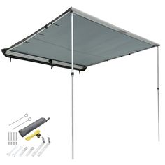 an awning is set up with tools and supplies to install the shade on top