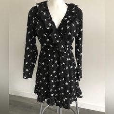 Nwt Nasty Gals Star Print Front Top Wrap Dress With Ruffles And Open Back. Size 8, Material Is Polyester. Please Note This Dress Is New With Tags But There Is A Small Defect Pictured That Is Really Not Noticeable When You Have The Dress On. Priced Accordingly Bundle With Other Items And Save. It Is Really A Super Fun Party Dress Black Star Print Dress For Spring, Spring Black Dress With Star Print, Black Star Print Dress, Black Dress With Star Print For Spring, Black Mini Dress With Star Print, Spring Star Print Dress For Date Night, V-neck Star Print Party Dress, Black Fitted Star Print Dress, Fitted Black Star Print Dress