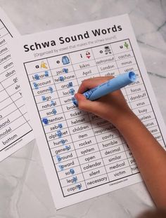 two schwa sound words are shown on top of each other with a blue marker