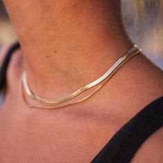 Elevate your style with this 18K gold plated stainless steel herringbone chain necklace. Its minimal and simple design exudes elegance, making it a versatile addition to your jewelry collection. The necklace is hypoallergenic, waterproof, fade-resistant, and tarnish-free, ensuring its beauty lasts for years. With proper care, the gold plating will remain radiant for at least 2 years. Perfect for everyday wear or special occasions. 14.5"L+2" extender. Gold Herringbone Necklace, Herringbone Chain, Herringbone Necklace, Staple Pieces, Initial Necklace, Gold Plating, Simple Design, Herringbone, Simple Designs