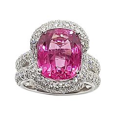 Spinel 5.88 carats with Diamond 1.77 carats Ring set in 18 Karat White Gold Settings GIA Certified Width: 1.3 cm Length: 1.7 cm Ring Size: 50 Total Weight: 12.31 grams "We first opened doors in 1980 when it was then situated in the vicinity of the Victory Monument; a small and modest storefront with a couple of counters. From its humble beginnings to where it stands today, our company has proven its abilities as a jeweler. Since the beginning, we have been supplying fine quality pieces to dealer Luxury Gia Certified Pink Sapphire Diamond Ring, Luxury Pink Sapphire Ring With Pave Setting, Luxury Pink Sapphire Ring With Vvs Clarity, Gia Certified Pink Sapphire Rings For Formal Occasions, Luxury Vvs Clarity Pink Sapphire Ring, Formal Gia Certified Pink Gemstones, Luxury Pink Sapphire Ring For Formal Occasions, Elegant Gia Certified Pink Sapphire Diamond Ring, Formal Pink Sapphire Diamond Ring