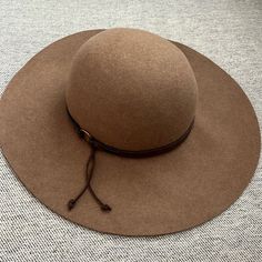 This Flirty Wide Brim Features A Feathered Crown Band. 100% Australian Wool, Size: 56cm, One Size Fits Most, Brand New, Never Worn, Adjustable. Chic Brown Felt Hat For The Beach, Chic Brown Felt Hat For Beach, Brown Felt Hat For Everyday Winter Use, Brown Winter Felt Hat For Everyday Wear, Casual Brown Felt Hat For Fall, Everyday Brown Felt Hat For Winter, Chic Brown Everyday Hat, Fall Hats For Women, Carhartt Hat