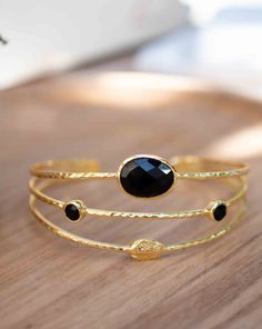 》D E T A I L S《 ✦ M E T A L : 18k Gold Plated ✦ S T O N E : Black Onyx ✧ Please note natural gemstones are unique and may vary in shape or color. ✧ ✦••✧••✦••✧••✦••✧••✦••✧••✦••✧••✦••✧••✦••✧••✦••✧••✦••✧••✦ 》✦ $•$•$ S A V E • B U Y • M O R E $•$•$ ✦《 Use the code MARESIA2 and get 10% OFF when you buy 2 items. Use the code MARESIA3 and get 15% OFF when you buy 3 or more items. ✦••✧••✦••✧••✦••✧••✦••✧••✦••✧••✦••✧••✦••✧••✦••✧••✦••✧••✦ 》 P A C K A G I N G 《 Your jewelry will be nicely packaged. If one o Black And Gold Jewelry, Black Jewelry, Bracelet Gold, Adjustable Bracelet, Black Onyx, Natural Gemstones, Onyx, Gold Jewelry, Gold Bracelet