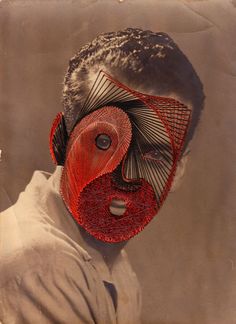 a man with a red mask on his face is shown in an old photo from the early 20th century