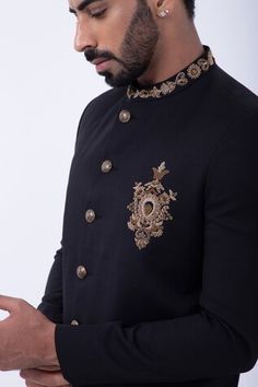 Black bandhgala with  zardozi embroidered floral motifs. Comes with pant. - Aza Fashions Traditional Fitted Sets With Gold Embroidery, Fitted Bandhgala With Gold Embroidery For Diwali, Fitted Bandhgala With Gold Embroidery For Festivals, Diwali Bandhgala With Gold Embroidery, Ceremonial Kurta With Gold Embroidery And Fitted Design, Ceremonial Fitted Kurta With Gold Embroidery, Black Sherwani With Gold Embroidery For Festive Occasions, Fitted Traditional Wear With Gold Embroidery, Ceremonial Sets With Gold Embroidery For Diwali