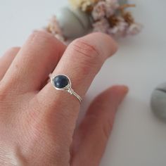 Tap into your wisdom with the energies of this uniquely crafted sapphire ring. Our sapphire ring is known for: HANDMADE ORIGINAL DESIGN - We customize each sapphire ring to the unique shape of its stone. Our ring has an easy to wear, stackable design. Tailor it to fit your mood and style AUTHENTIC STONES & ALLERGY FREE MATERIALS - Your sapphire is authentic and natural. We only use high quality nickel-free and lead-free materials Ring Specifics: SIZE & MATERIALS - Size of the sapphire is about 6 Adjustable Sapphire Ring In Fine Jewelry Style, Adjustable Sapphire Ring Fine Jewelry, Adjustable Sapphire Promise Ring, Sapphire Birthstone Ring As Gift, Handmade Adjustable Sapphire Ring For Anniversary, Spiritual Sapphire Promise Ring, Adjustable Sapphire Ring With Birthstone, Sapphire Rings With Natural Stones For Gift, Handmade Spiritual Sapphire Ring For Anniversary