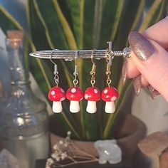 💖 High quality handmade glass beaded mushroom earrings in pink, red or brown. Presented on silver or gold tone earring hooks with hypoallergenic silicone backs included  ️Measurements:  Mushroom bead: 18mm Hook: 18mm Light weight: 2.5g each ✨️Metal Information: Silver Tone: Silver plated alloy (iron based alloy, free from lead, nickel and cadmium) Gold Tone: Lead and nickle safe gold coloured metal alloy. 🌿 Metal Allergies? I have a range of other metal and non metal options (including clip on Beaded Mushroom Earrings, Beaded Mushroom, Fairycore Earrings, Fairy Jewellery, Mushroom Earrings, Fairy Jewelry, Glass Mushrooms, Handmade Glass Beads, Earring Hooks