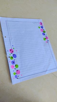 a piece of paper with flowers on it