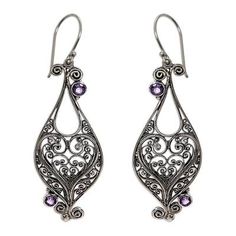 Heart-shaped Balinese swirl motifs are handcrafted from sterling silver in this pair of dangle earrings by Indonesia's Eka Devi. Over one carat of amethyst stones adorn these earrings for a loving and regal appearance. Amethyst Stones, Snow Jacket, Balinese, Bead Earrings, Amethyst Stone, Beaded Earrings, Swirl, Heart Shapes, Premium Quality