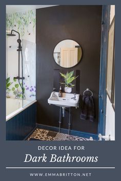 a bathroom with black walls and white fixtures, the words decor idea for dark bathrooms