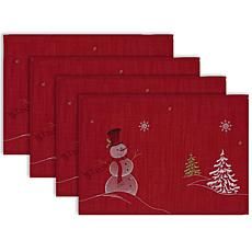 four red napkins with snowmen and trees on them