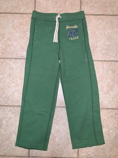 NWOT Abercrombie Boys Large Green Draw Tie Waist Sweat Pants New without tag.    Shop my Ebay store by size with ease. Simply click on my Store Icon, choose the category you are shopping (i.e. Boys Clothing) then simply click on the size you are shopping for (i.e. Size 6). Everything I have in that size is listed in a couple of simple clicks. I require payment to be received within 2 days from close of auction. I try and describe each item as honestly as I can and disclose any irregularities as Casual School Pants With Elastic Waistband, Casual Pants With Elastic Waistband For School, Green Cotton Sweatpants For Fall, Sporty Cotton Bottoms For School, Cotton Bottoms With Elastic Waistband For School, Cotton School Bottoms With Elastic Waistband, Casual Fall Bottoms For School, School Pants With Pockets For Fall, Fall School Pants With Pockets