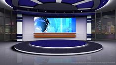 an empty tv studio with blue and white walls