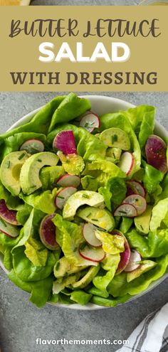 a bowl filled with lettuce and radishes on top of a table