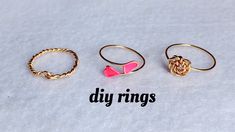 three different rings sitting next to each other on top of a white sheet with the words diy rings written below them