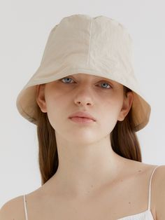 Editor's Noteshalden is a brand that started with the minimalism and warm sensibility of Northern Europe.- Bucket hat- Seamless brim- Brand logo pendant detail- Lightweight and breathable- Top stitching detail- Simple and casual Measurements (in.)- Head Girth: 22.05 in.- Depth: 6.1 in. Composition & Care- 100% Nylon- Do not wash or dry cleaning- Do not squeeze or iron- Wipe off moisture and stains with a dry cloth with little moistureDesigner- by halden Everyday Lightweight Solid Sun Hat, Everyday Lightweight Solid Color Sun Hat, Lightweight Flat Brim Bucket Hat For Everyday, Cream Lightweight Bucket Hat With Flat Brim, Lightweight Cream Bucket Hat With Flat Brim, Lightweight Brimmed Bucket Hat For Everyday, Lightweight Everyday Brimmed Bucket Hat, Beige Bucket Hat For Everyday, Solid Color Brimmed Hat For Everyday