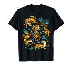 PRICES MAY VARY. Carry around the spirit of a crouching tiger with this Asian art inspired t shirt design This tiger looks ferocious and ready to pounce but it is also playful and fun in different dancing poses Lightweight, Classic fit, Double-needle sleeve and bottom hem Tiger Cartoon, Dancing Poses, Novelty Clothing, Top Fashion Brands, Couple Shirts, Shop Top, Perfect Shirt, Fashion Brands, Types Of Shirts