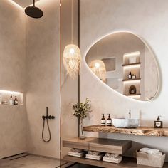 a bathroom with a sink, mirror and lights on the wall next to each other