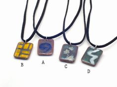 These pendants are part of my "Everyday enamels" series. I started these fun pendants with a variety of colors as a base for the designs.! Then I sifted on the fun designs!From left to right, the pendants are:A. A bold cobalt swirl on a subtle transparent blue baseB. Graphic marigold yellow brick pattern on a subtle transparent green baseC. Translucent white ivy leaves on a subtle transparent green baseD. A white swoosh on a gem green baseThe reverse of all the pendants is speckled blue counter Hand Painted Rectangular Jewelry As Gift, Artistic Rectangular Necklace For Gifts, Artistic Rectangular Necklace For Gift, Rectangular Multicolor Necklaces As Gift, Multicolor Rectangular Necklace As Gift, Marigold Yellow, Brick Patterns, Green Pearls, Coin Pearls