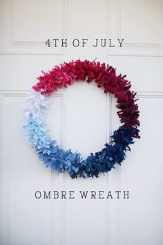 the fourth of july wreath is decorated with red, white and blue flowers