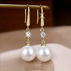 Brand New Women's Hanging Pearl & Diamond Earrings 18k Gold Plated Sterling Silver Genuine 2ct Lab Created Diamonds Real Natural Freshwater Pearls Measurements 1.7" H X 12mm Retail Price $350 Buy With Confidence From A Trusted Seller W/ A 99%+ Feedback Rating! A0239 (Id-730-) Elegant White Diamond Earrings, White Pearl Earrings With Diamond Accents For Anniversary, Elegant White Diamond Earrings With Accents, Classic White Earrings With Diamond Accents, Elegant Gold Round Cut Earrings, Elegant Round Cut Gold Earrings, Classic Cubic Zirconia Earrings, Elegant White Diamond Earrings With Elegant Design, Elegant Aaa Quality Diamond Earrings For Wedding