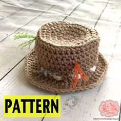 a crocheted hat sitting on top of a white wooden floor with the words pattern written below it