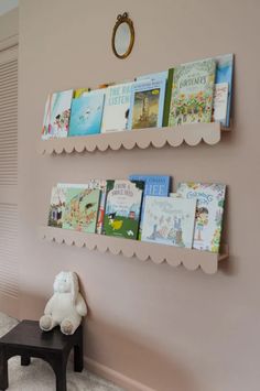 two bookshelves on the wall with children's books