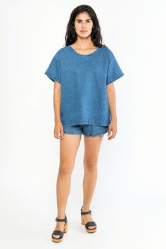 The Denim T-Shirt is constructed out of 10 oz denim and then dyed and treated with enzymes for a slight softening effect. The result is a workwear-inspired piece that’s functional and perfect in its simplicity. Features a slightly oversized, boxy fit with side seam vents at the hem. Wear this alone as a top or layer over long sleeves. | Shirt For Women In Dark Medium Wash, Size Small Relaxed Fit Washed Tencel Tops, Relaxed Fit Medium Wash Denim Top, Relaxed Fit Denim T-shirt With Crew Neck, Relaxed Fit Washed Blue Cotton Denim Top, Relaxed Fit Washed Blue Tops, Dark Wash Denim Short Sleeve Top, Oversized Washed Denim Blue Top, Relaxed Fit Denim Tops, Denim Blue Cotton Crew Neck Top