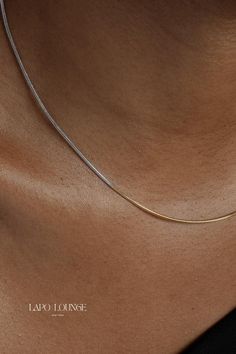 Elevate your everyday style with our tarnish-resistant stainless steel necklaces, perfect for effortless everyday wear. Crafted to shine through every moment, these pieces are not only stunning but also make the perfect gifts for any occasion. Explore the timeless beauty of stainless steel jewelry that stays brilliant day after day. #necklaces #stainlesssteeljewelry #everydaywear #giftideas Chic Metal Necklace With Snake Chain, Chic Tarnish-resistant Metal Chain Necklace, Minimalist Metal Snake-shape Chain Necklace, Silver Brass Snake Chain Necklaces, Gold-tone Metal Snake Chain Necklace, Metal Snake, Stainless Steel Necklace, Mixed Metals, Steel Jewelry