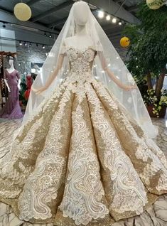 a wedding dress on display in a store