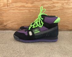 --  Vintage 80s to early 1990s Mens Colorado High Top Colorblock Sneakers --  Excellent condition and looks to have hardly been worn   --  Awesome look! --  Soles bend and are supple, but wear at your own risk --  Made in Korea --  Mens tag size 11, but please see below for exact measurements --  Thanks for looking and be sure to check out my other items! MEASUREMENTS Height - 6 inches Width - 4 1/8 inches Length - 12 inches Casual Purple High-top Skate Shoes, Green High-top Skate Shoes With Branded Insole, Retro Multicolor High-top Skate Shoes, Purple Leather High-top Skate Shoes, Multicolor Synthetic Lace-up Skate Shoes, Colorblock Sneakers, Tie Shoes, Neon Green, Tennis Shoes