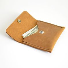 This Mini Wallet is great for holding cards, cash & coins. For those that like to keep things fun & simple, this is for you. Minimalist approved! Distressed Honey Leather ...• Fast & FREE USPS Shipping• Made with a single piece of Full-Grain leather• Open interior pocket• Shiny nickel hardware• 4.5"W x 3.5"H• Handmade in Bellingham, WashingtonQuestions? Contact me before placing your order! Bifold Coin Purse With Card Slots For Everyday Use, Everyday Bifold Coin Purse With Card Slots, Minimalist Bifold Coin Purse With Coin Pocket, Minimalist Bifold Coin Purse With Card Slots, Minimalist Bifold Coin Purse With Interior Card Slots, Bellingham Washington, Small Leather Wallet, Woman Card, Card Pouch