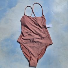 Light Pink Peach Colored High Leg One-Piece Swimsuit, Bathing Suit. Brand New With Tags & Inner Liner, Never Tried On. Basic One Piece With Plain Front, Criss Cross Back Straps, Has Criss Crossing At Back That Is Sexy & Stylish. Size M. Brand Is Pacsun. Perfect For The Beach & Pool. Very Flattering Style & Cut, High Leg Cut. See Photos For The Best Visual Reference. All Sales Are Final. Ready To Ship. Pink One-piece Swimsuit For Sunbathing, Pink One-piece Swimsuit For Beach Season, Pink One Pieces For Poolside Summer, Pink One-pieces For Poolside Summer, Pink Beachwear One Piece For Beach Season, Pink Beachwear One-pieces For Beach Season, Pink Stretch One-piece Swimsuit For Vacation, Pink Stretch Vacation Swimsuit, Pink Summer One-piece Swimsuit For Pool