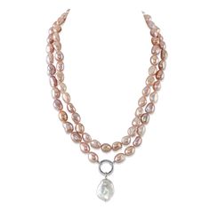 This 9.5-10.5mm oval pink freshwater double strand pearl necklace is certain to grab the attention of anyone who sees this beauty. This pearl necklace is compiled of two strands of hand picked oval pink freshwater pearls with high grade luster that has an exquisite 14-16mm dangling baroque pearl dangling. This necklace feature a 17" extendable to 18" Sterling silver or Yellow gold plated clasp Oval Pearl Necklace, Elegant Pink Oval Beaded Necklaces, Classic Pink Pearl Drop Necklace, Pink Single Strand Pearl Jewelry, Elegant Pink Baroque Pearl Necklace, Pink Baroque Pearl Necklace With Pendant, Pink Baroque Pearl Single Strand Necklace, Double Strand Pearl Necklace, Luxury Pink Baroque Pearl Necklace