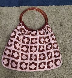 Vintage Beige Hobo Bag For Shopping, Beige Granny Square Shoulder Bag, Brown Granny Square Crochet Tote Bag, Brown Crochet Tote Bag With Granny Square, Brown Crochet Hobo Bag For Everyday Use, Brown Hobo Crochet Bag For Everyday, Beige Crochet Handheld Shoulder Bag, Handheld Beige Crochet Shoulder Bag, Brown Granny Square Beach Bags