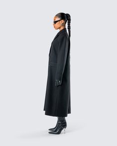 A coat made for our baddies who like to intimidate and entice 😏 Take charge in this black double-breasted coat made from structured woven suiting and complete with button closures 🖤 Tailored Black Wool Coat With Double Button Closure, Black Fitted Outerwear With Double Button Closure, Fitted Black Outerwear With Double Button Closure, Structured Black Outerwear For Formal Occasions, Structured Black Formal Outerwear, Tailored Black Wool Long Coat, Fitted Double-breasted Long Coat, Chic Winter Streetwear Blazer, Black Double-breasted Structured Outerwear