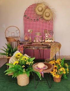 a table with flowers and hats on it