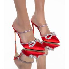 Backless Party Stilettos Pump Sandal -Red Style These With A Sexy Satin Mini Dress For A Sparkly Night Out Pointed Toe 4.5” Stiletto Heel Rhinestone-Embellished Strap Rhinestone Trim Rhinestone Bow Size: 7,8,9,10 Glamorous Sandals With 4-inch Heel For Party, Chic Party Sandals With 4-inch Heel, Chic Holiday Heels With Wrapped Heel, Holiday High Heel Sandals, Holiday Cocktail Heels With Ankle Strap, Party High Heel Sandals, Chic Closed Toe Holiday Heels, Holiday Open Toe Heels With 4-inch Heel, Chic Closed Toe Heels For Holidays